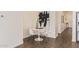 Bright dining area featuring modern decor, a round table, and hard wood floors at 1951 W Plum Rd, Phoenix, AZ 85085
