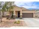 Beautiful single-Gathering home with desert landscaping, a two-car garage, and covered front porch at 1951 W Plum Rd, Phoenix, AZ 85085