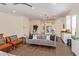Cozy living room featuring modern furniture, hardwood floors, and bright, airy space at 1951 W Plum Rd, Phoenix, AZ 85085