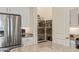 Open pantry showcasing shelving with baskets and organized food storage containers at 1951 W Plum Rd, Phoenix, AZ 85085