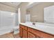 Bright bathroom with a tub, shower, and vanity with a sink at 209 E Diamond Trl, San Tan Valley, AZ 85143