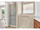 Bathroom featuring a walk-in tub/shower and a linen closet at 209 E Diamond Trl, San Tan Valley, AZ 85143