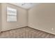Bedroom with neutral carpet flooring and natural lighting at 209 E Diamond Trl, San Tan Valley, AZ 85143