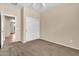 Neutral bedroom with a closet, carpet flooring, and neutral-toned walls at 209 E Diamond Trl, San Tan Valley, AZ 85143