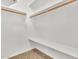 Walk-in closet with shelving for easy and organized storage at 209 E Diamond Trl, San Tan Valley, AZ 85143