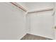 Walk-in closet space with shelving and carpet flooring at 209 E Diamond Trl, San Tan Valley, AZ 85143