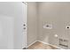 The laundry room features a hookup for a washing machine and dryer at 209 E Diamond Trl, San Tan Valley, AZ 85143