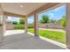 Covered patio area offering shade and an outdoor living space at 209 E Diamond Trl, San Tan Valley, AZ 85143