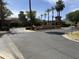 View of the Verrado Golf Club entrance with lush landscaping and beautiful desert scenery at 21183 W Main St, Buckeye, AZ 85396