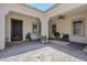 Inviting courtyard with paver flooring, a seating area, and classic architectural details at 22255 E Quintero Rd, Queen Creek, AZ 85142
