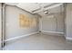 Spacious garage features an epoxy floor, ample lighting, and plenty of room for storage and parking at 22255 E Quintero Rd, Queen Creek, AZ 85142