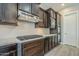 Gourmet kitchen with stainless steel appliances, sleek countertops, and ample cabinet space at 22255 E Quintero Rd, Queen Creek, AZ 85142