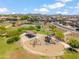 A neighborhood park offers a playground and picnic area with green spaces at 22341 N 100Th Ln, Peoria, AZ 85383