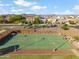 A shot of the community basketball court surrounded by beautiful homes in a well-maintained neighborhood at 22341 N 100Th Ln, Peoria, AZ 85383
