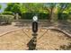 Outdoor exercise equipment area with wood chip ground cover provides a convenient and accessible fitness space in the community at 2264 S Don Carlos --, Mesa, AZ 85202