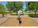 Community fitness area features outdoor exercise equipment for residents to maintain an active lifestyle in a park-like setting at 2264 S Don Carlos --, Mesa, AZ 85202