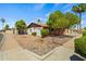 Single-story home featuring mature landscaping and an attached two-car garage at 2264 S Don Carlos --, Mesa, AZ 85202