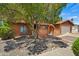 Welcoming single-story home featuring desert landscaping and a private front entry at 2264 S Don Carlos --, Mesa, AZ 85202
