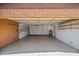 Spacious garage with ample storage shelving, a water heater and plenty of room for multiple cars at 2264 S Don Carlos --, Mesa, AZ 85202