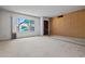 Comfortable living room with large window and neutral tones at 2264 S Don Carlos --, Mesa, AZ 85202