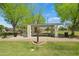 Park area features a covered picnic area surrounded by lush greenery and playground at 2264 S Don Carlos --, Mesa, AZ 85202