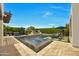 Inviting outdoor space with a pool, jacuzzi, and lounge area perfect for relaxation and entertaining guests at 3109 E Sierra Madre Way, Phoenix, AZ 85016