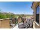 Balcony seating with golf course and mountain views in background at 3554 N Hooper St, Buckeye, AZ 85396