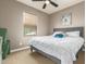 Cozy bedroom with a ceiling fan and nice window views at 3554 N Hooper St, Buckeye, AZ 85396