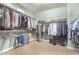 Spacious walk-in closet with organized shelving and hanging space at 3554 N Hooper St, Buckeye, AZ 85396