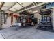 Well-organized garage with storage solutions and ample space for vehicles and equipment at 3554 N Hooper St, Buckeye, AZ 85396
