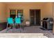 Outdoor patio features seating, grill, and convenient access to the home's main entrance at 3554 N Hooper St, Buckeye, AZ 85396