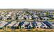 Beautiful aerial view of a neighborhood, with swimming pools in the backyards of some of the homes at 3684 E Boot Track Trl, Gilbert, AZ 85296