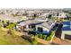 Aerial view showcasing a backyard with a pool, outdoor seating, and a covered patio, perfect for entertaining at 3684 E Boot Track Trl, Gilbert, AZ 85296
