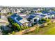 Aerial shot of a modern home featuring a private pool, covered outdoor dining, and meticulously manicured landscaping at 3684 E Boot Track Trl, Gilbert, AZ 85296