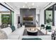 Modern fireplace with gray marble surround and built in television above at 3684 E Boot Track Trl, Gilbert, AZ 85296