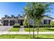 Daytime view of the home's exterior with a manicured lawn and neatly trimmed landscaping at 3684 E Boot Track Trl, Gilbert, AZ 85296