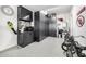 Organized garage featuring custom cabinets, tool storage, and epoxy flooring for a clean, functional space at 3684 E Boot Track Trl, Gilbert, AZ 85296