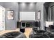 Spacious home theater with a large screen, comfortable seating, and sleek design at 3684 E Boot Track Trl, Gilbert, AZ 85296