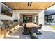 Well-equipped outdoor kitchen and dining area for seamless outdoor entertaining and relaxation at 3684 E Boot Track Trl, Gilbert, AZ 85296