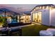 Backyard featuring pool, a cozy seating area, and large windows offering seamless indoor-outdoor living at 3684 E Boot Track Trl, Gilbert, AZ 85296