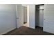 Simple bedroom with closet and fresh carpeting at 38055 W Excussare Way, Maricopa, AZ 85138