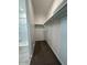 Walk in closet with shelving and carpeted floor at 38055 W Excussare Way, Maricopa, AZ 85138