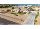 Single-story home featuring a tiled roof and a low-maintenance gravel yard with lush landscaping at 3911 N 197Th Ave, Buckeye, AZ 85396