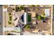 Bird's-eye view showcases home with solar panels, backyard features including grass and play area at 3911 N 197Th Ave, Buckeye, AZ 85396