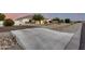 Well-maintained single-story home with stone accents, mature trees, and extra parking at 3911 N 197Th Ave, Buckeye, AZ 85396