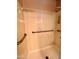 Accessible walk-in shower with grab bars providing safety and convenience at 3932 E Tierra Buena E Ln, Phoenix, AZ 85032