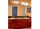 Bathroom vanity with double sinks and a granite countertop offers modern style and convenience at 3932 E Tierra Buena E Ln, Phoenix, AZ 85032