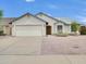 Charming single-story home featuring a two-car garage and low-maintenance desert landscaping at 3932 E Tierra Buena E Ln, Phoenix, AZ 85032