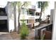 Well maintained property showing the exterior with green trees, a courtyard, and outdoor walkways at 4120 N 78Th St # 116, Scottsdale, AZ 85251