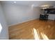 Open floor plan with hardwood floors and natural light at 4120 N 78Th St # 116, Scottsdale, AZ 85251